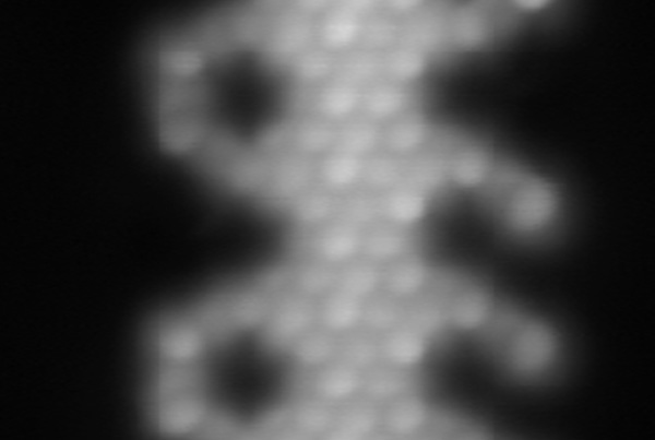 Subnanometer pores in graphene nanoribbons